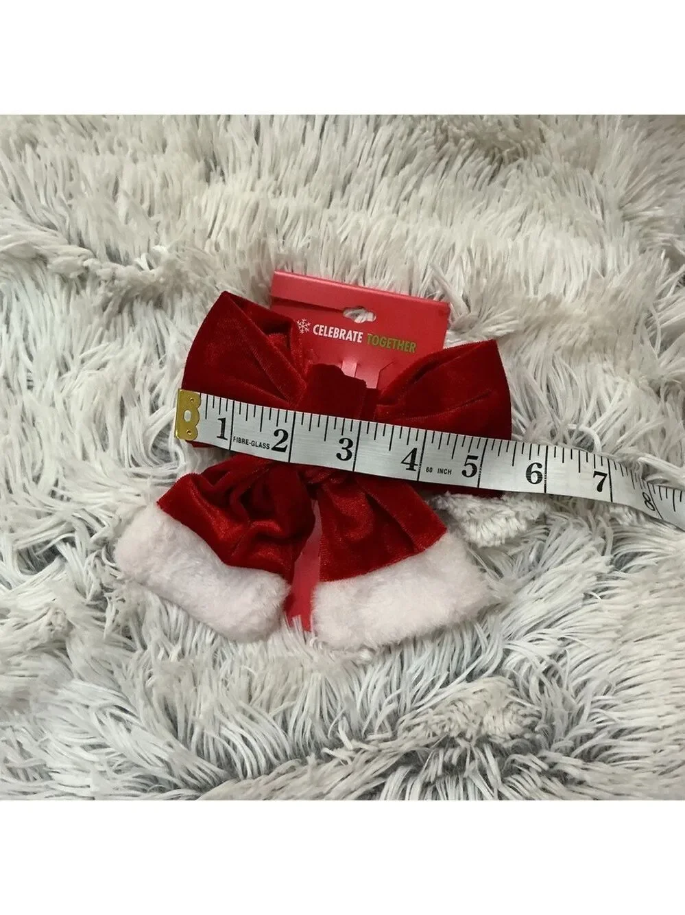 Celebrate Together oversized red velvet bow hair clip with white trim